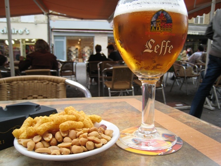 Cold beer, poor quality snacks, but good street entertainment!