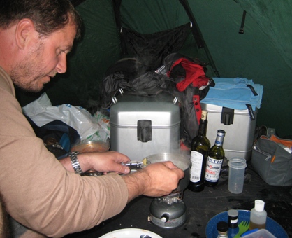 Cooking inside the tent during a storm…