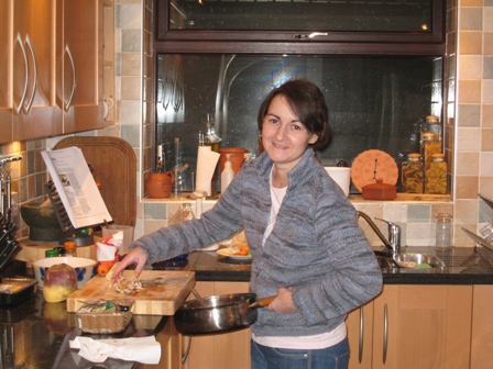 Back in the kitchen, cooking her husband his tea...