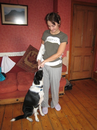 A rather skinny Tracy, in back-brace, being looked after by Jake…