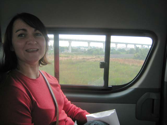 Tracy, sat in the minibus en-route to Bangkok