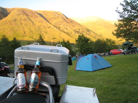 A couple of friends relax on my bike at Glen Nevis campsite…