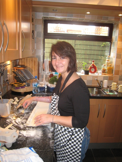 Tracy making sausage rolls on Christmas Eve