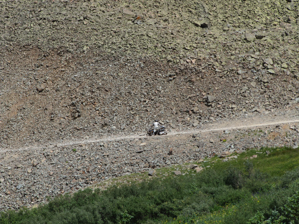 Aaron drops his bike on Ophir Pass