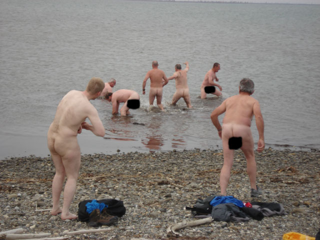 A bunch of naked bikers go for a swim on the Arctic Ocean