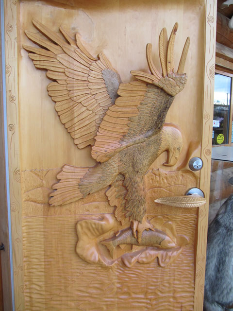 The intricately carved door to the gift shop