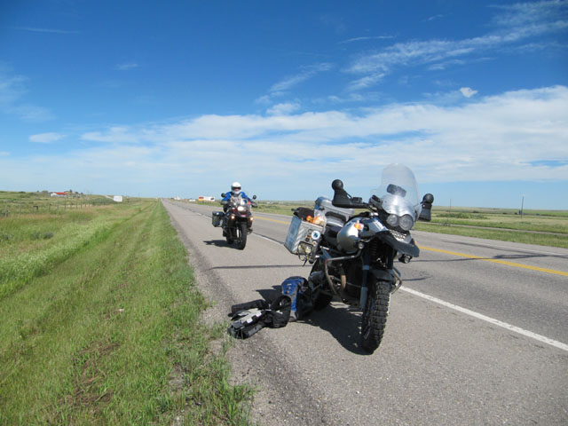 Nick returns with fuel for my stranded bike...