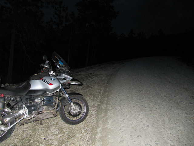 Broken bike, dark forest...