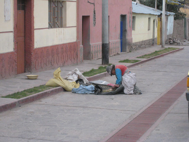 Sorting beans in the street...