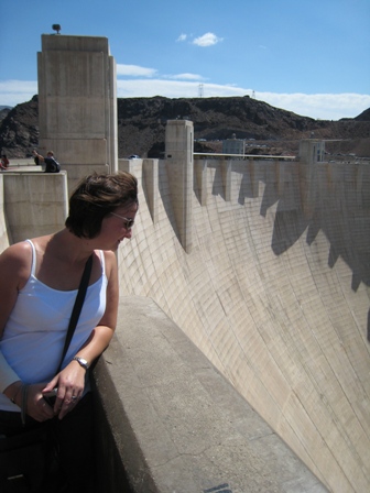 Tracy peers down the massive Hoover Dam...