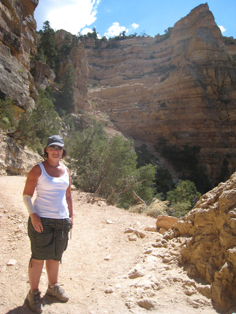  Tracy on the trail, with our route back up behind her