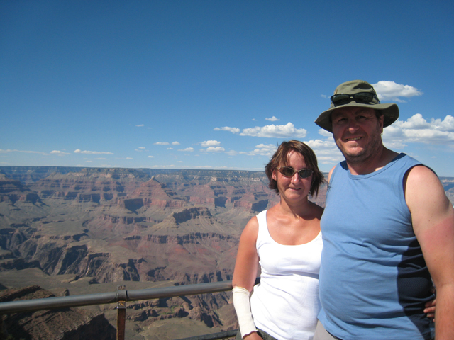 Tracy and Paul with a large hole in the ground