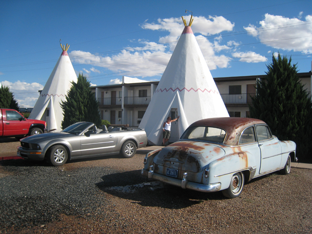 Tracy outside our home for the night, our concrete wigwam!