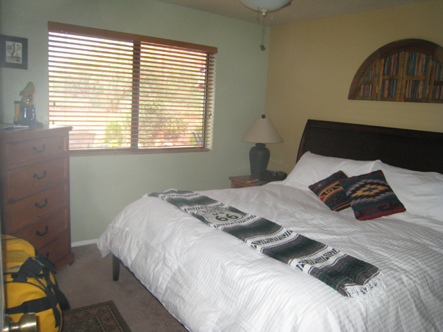 Our bedroom, complete with huge bed and a machine that makes soothing noises for us to fall asleep to …