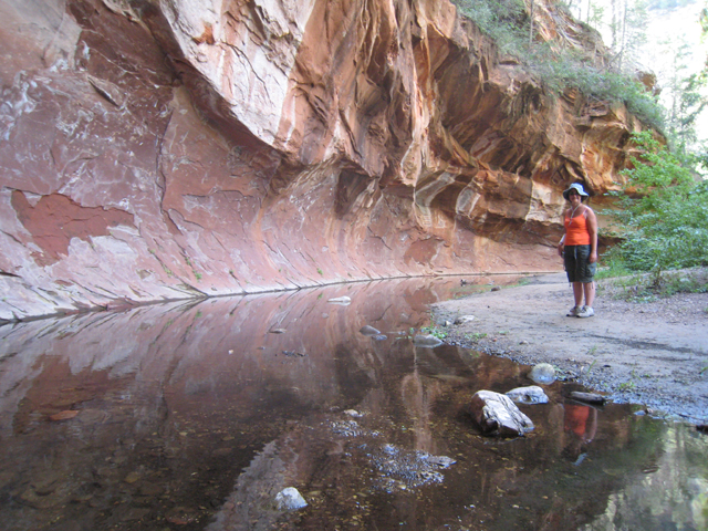 Tracy admires the sweeping curves of the rocks on the West Fork trail…